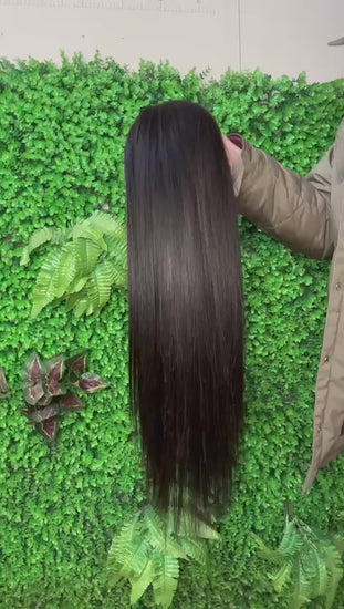 Natural black straight lace front wig made from 100% human hair showing length, shine, and natural movement.